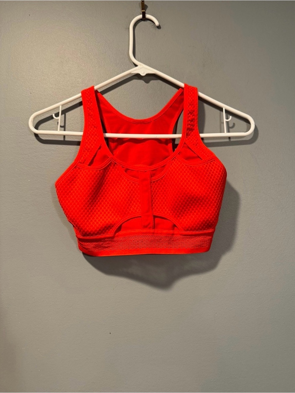 * Woman’s Orange Nike Sports Bra